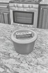 Container labeled "Stewish" on kitchen countertop.